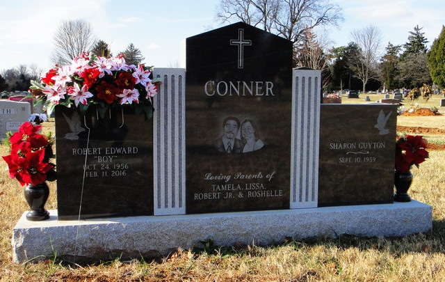 Conner Front of Headstone with Columns and Portrait Etchings